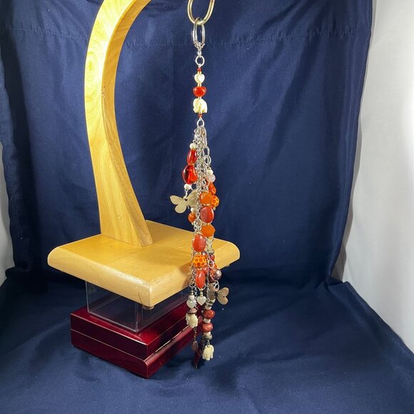 Handcrafted Artisan Autumn Safari Bag Charm With Orange & Earth-Tone Beads Anima - Picture 2 of 2